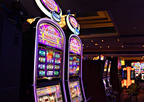 Mobile phone showing boomingbet login app interface with support chat and account dashboard